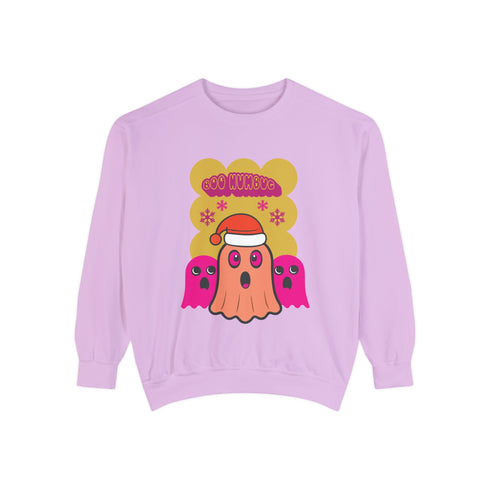 A holiday sweatshirt featuring a cute ghost character wearing a Santa hat, with two smaller ghosts on either side. Above them is the playful text "Boo Humbug," surrounded by snowflakes and festive elements. The design humorously combines spooky and festive themes for a unique holiday look.